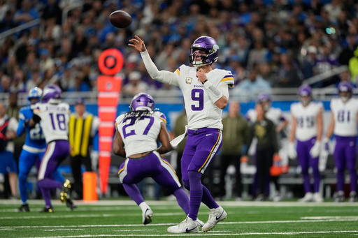 Minnesota Vikings quarterback J.J. McCarthy (9) passes during the first half of an NFL football game against the Detroit Lions Sunday, Nov. 2, 2025, in Detroit. (AP Photo/Ryan Sun)