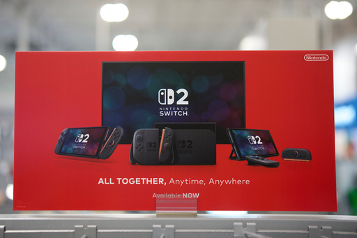 A Nintendo Switch 2 display appears at a Best Buy in Nashville, Tenn., on une 5, 2025, (AP Photo/George Walker IV)